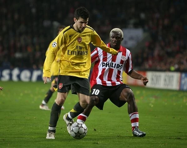 Cesc Fabregas (Arsenal) Arouna Kone (PSV)