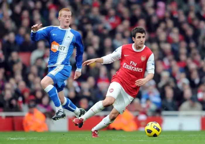 Framed Print : Cesc Fabregas (Arsenal) Ben Watson (Wigan). Arsenal 3: 0 Wigan Athletic