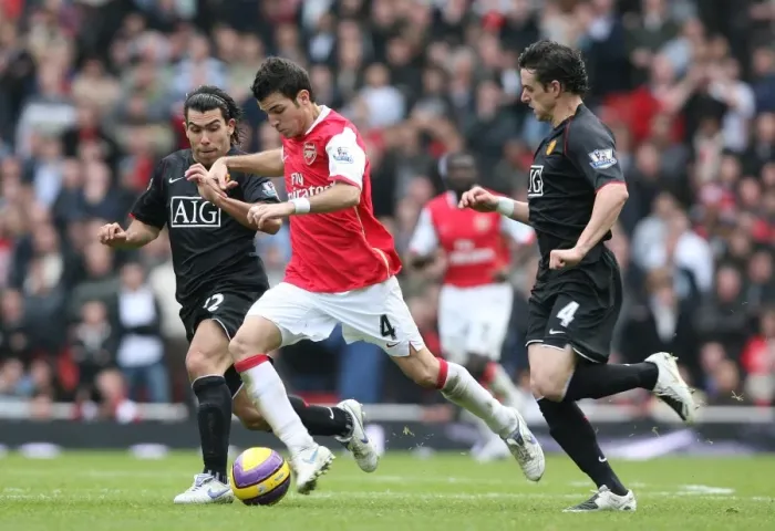 Framed Print : Cesc Fabregas (Arsenal) Carloz Tevez and Owen Hargreaves (Manchester United) Framed Print : Cesc Fabregas (Arsenal) Carloz Tevez and Owen Hargreaves (Manchester United)