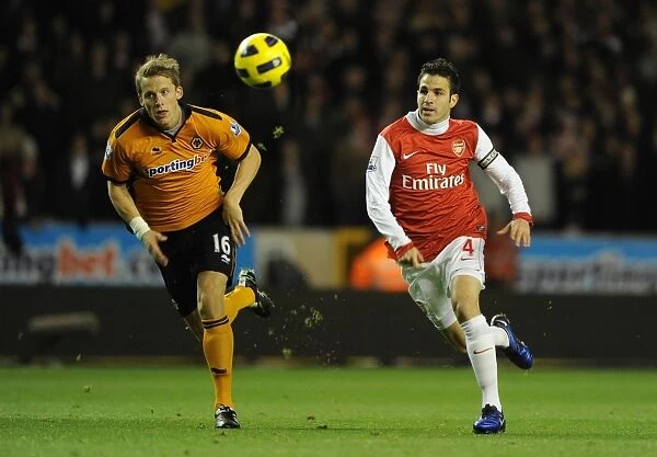 Cesc Fabregas (Arsenal) Christophe Berra (Wolves). Wolverhampton Wanderers 0:2 Arsenal