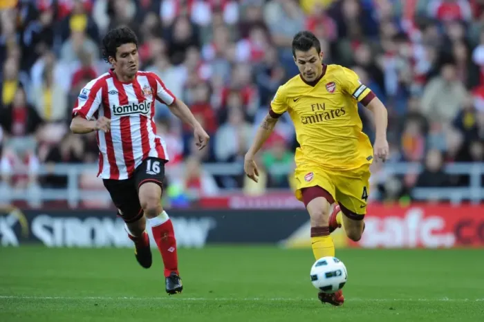 Framed Print : Cesc Fabregas (Arsenal) Cristian Riveros (Sunderland). Sunderland 1: 1 Arsenal