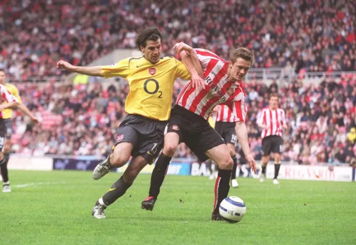 Framed Print : Cesc Fabregas (Arsenal) George McCartney (Sunderland) Framed Print : Cesc Fabregas (Arsenal) George McCartney (Sunderland)