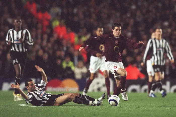 Framed Print : Cesc Fabregas (Arsenal) Gianluca Zambrotta (Juventus). Arsenal 2: 0 Juventus