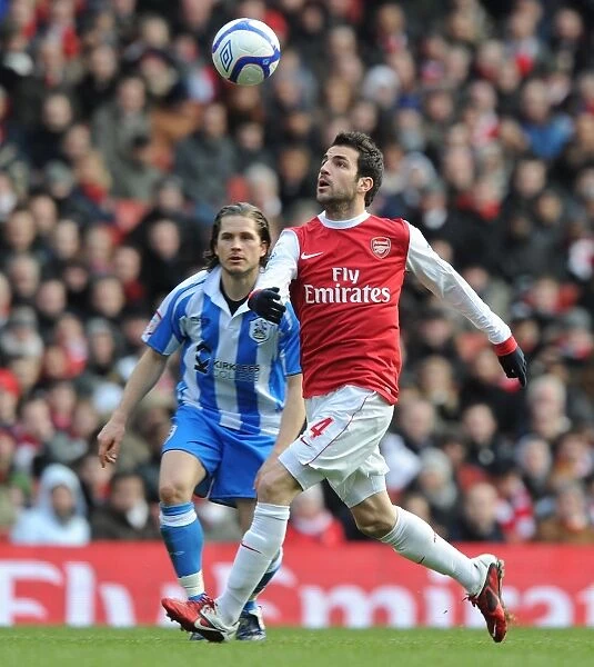Cesc Fabregas (Arsenal) Joey Gudjonsson (Huddersfield). Arsenal 2: 1 Huddersfield Town