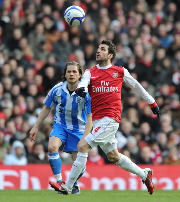 Framed Print : Cesc Fabregas (Arsenal) Joey Gudjonsson (Huddersfield). Arsenal 2: 1 Huddersfield Town