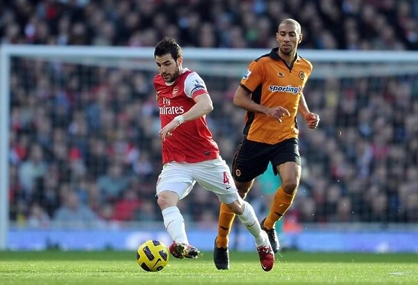 Cesc Fabregas (Arsenal) Karl Henry (Wolves). Arsenal 2: 0 Wolverhampton Wanderers