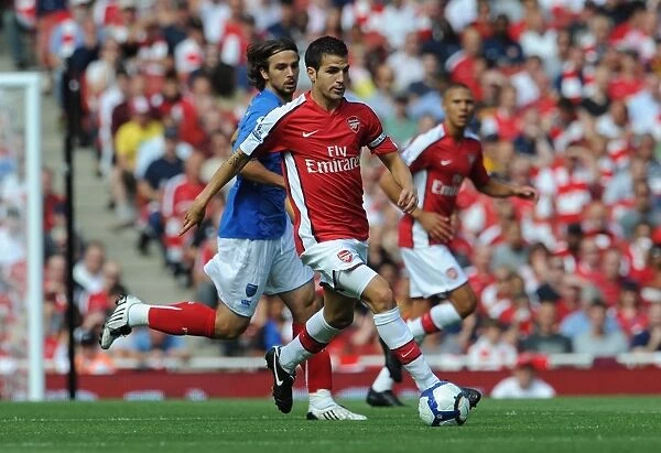 Cesc Fabregas (Arsenal) Niko Kranjcar (Portsmouth)