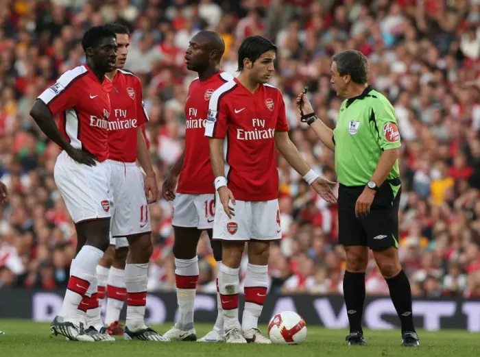 Framed Print : Cesc Fabregas (Arsenal) and referee Alan Wiley Framed Print : Cesc Fabregas (Arsenal) and referee Alan Wiley