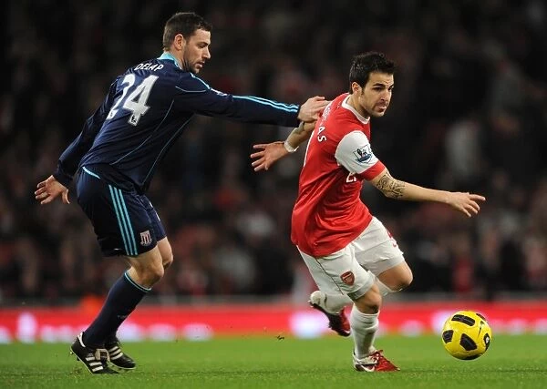 Cesc Fabregas (Arsenal) Rory Delap (Stoke). Arsenal 1: 0 Stoke City. Barclays Premier League