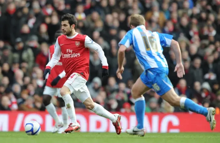 Framed Print : Cesc Fabregas (Arsenal) Scott Arfield (Huddersfield). Arsenal 2: 1 Huddersfield Town
