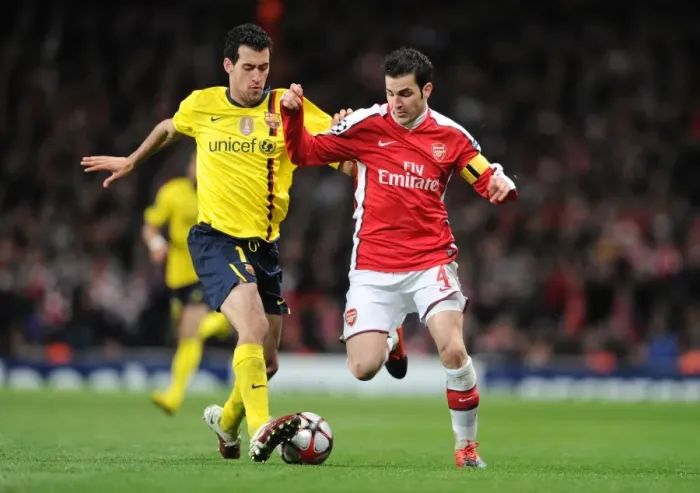 Framed Print : Cesc Fabregas (Arsenal) Sergio Busquets (Barcelona). Arsenal 2: 2 Barcelona