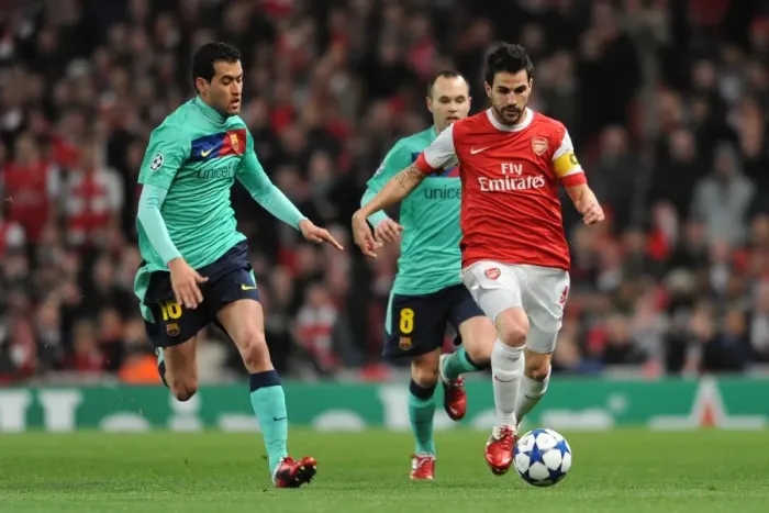 Framed Print : Cesc Fabregas (Arsenal) Sergio Busquets (Barcelona). Arsenal 2: 1 Barcelona