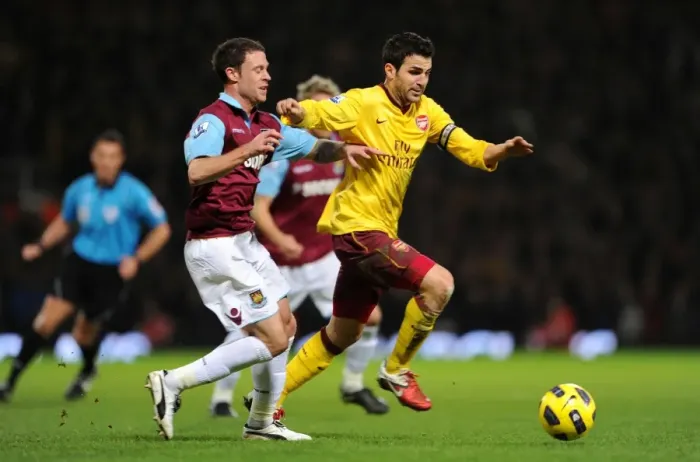 Framed Print : Cesc Fabregas (Arsenal) Wayne Bridge (West Ham). West Ham United 0: 3 Arsenal