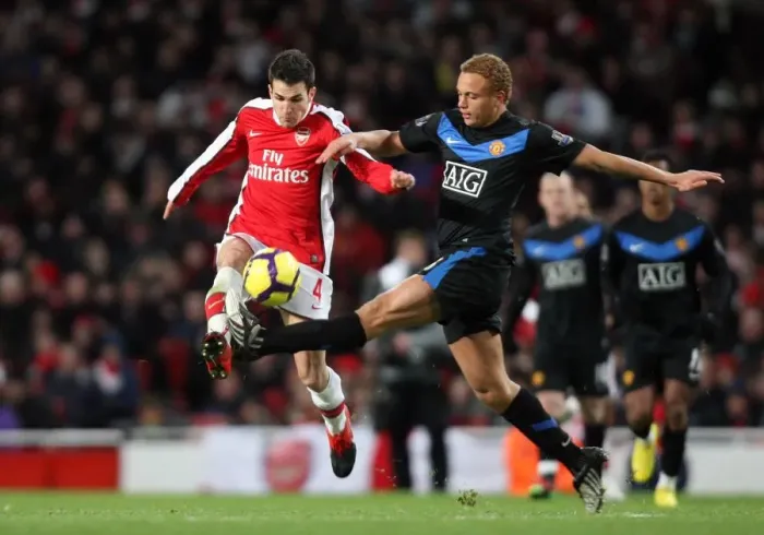 Framed Print : Cesc Fabregas (Arsenal) Wes Brown (Man Utd). Arsenal 1: 3 Manchester United