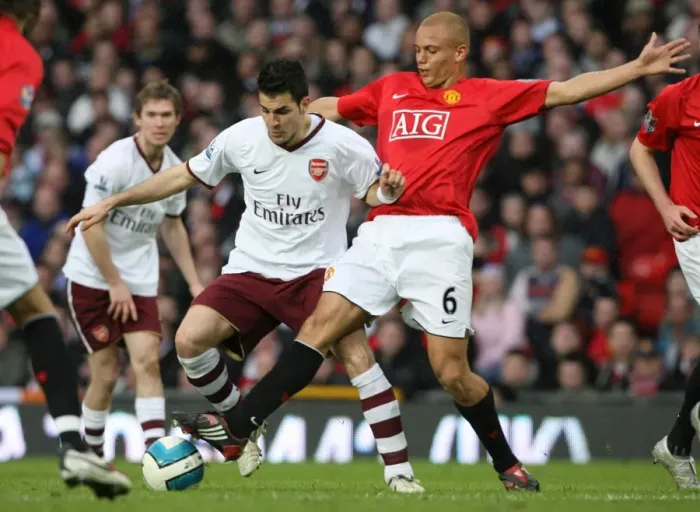 Framed Print : Cesc Fabregas (Arsenal) Wes Brown (Manchester United)
