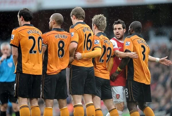 Cesc Fabregas (Arsenal) in the Wolves wall. Arsenal 2: 0 Wolverhampton Wanderers