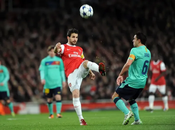 Framed Print : Cesc Fabregas (Arsenal) Xavi (Barcelona). Arsenal 2: 1 Barcelona. UEFA Champions League
