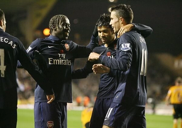 Cesc Fabregas celebrates scoring the 3rd Arsenal goal