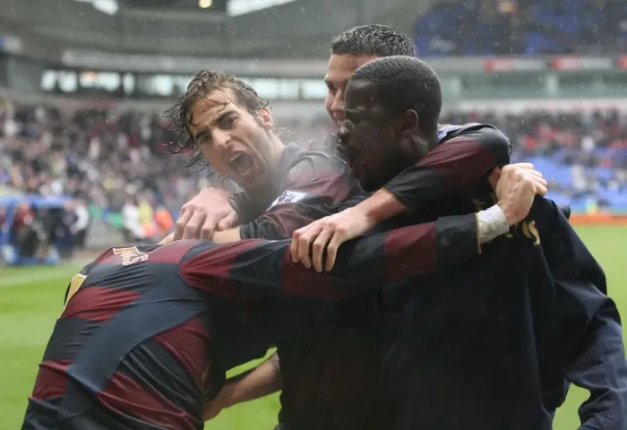 Framed Print : Cesc Fabregas celebrates scoring the 3rd Arsenal goal with Emmanuel Eboue