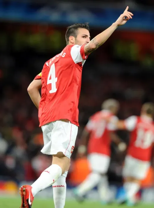 Framed Print : Cesc Fabregas celebrates scoring the 4th Arsenal goal. Arsenal 6: 0 SC Braga