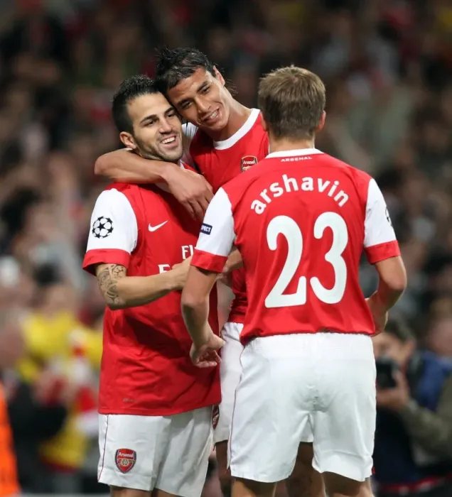 Framed Print : Cesc Fabregas celebrates scoring Arsenal and his 1st goal with Marouane Chamakh
