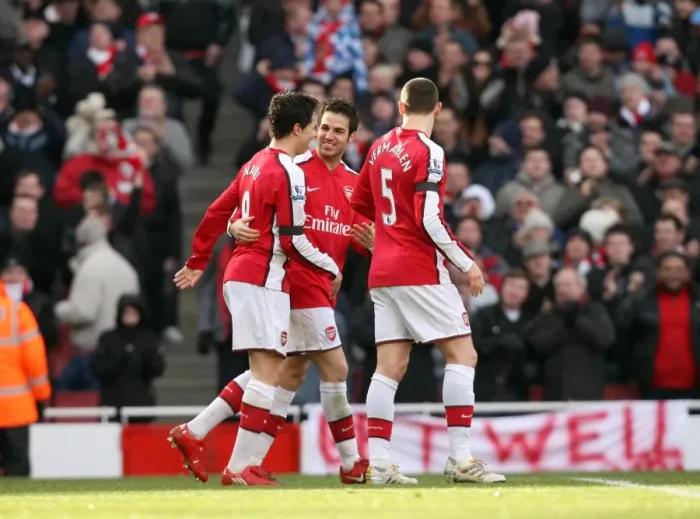 Framed Print : Cesc Fabregas celebrates scoring Arsenals 1st goal with Samir Nasri