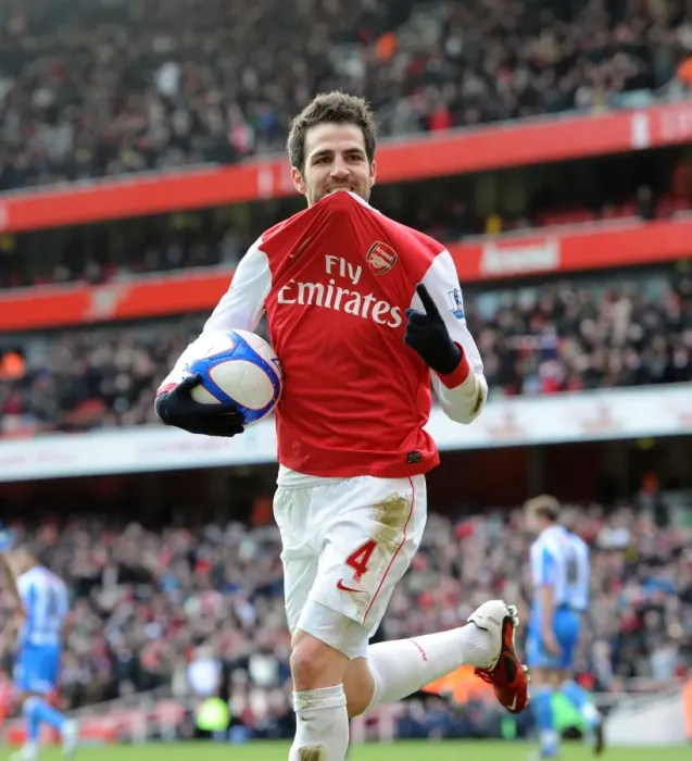 Framed Print : Cesc Fabregas celebrates scoring Arsenals 2nd goal. Arsenal 2: 1 Huddersfield Town