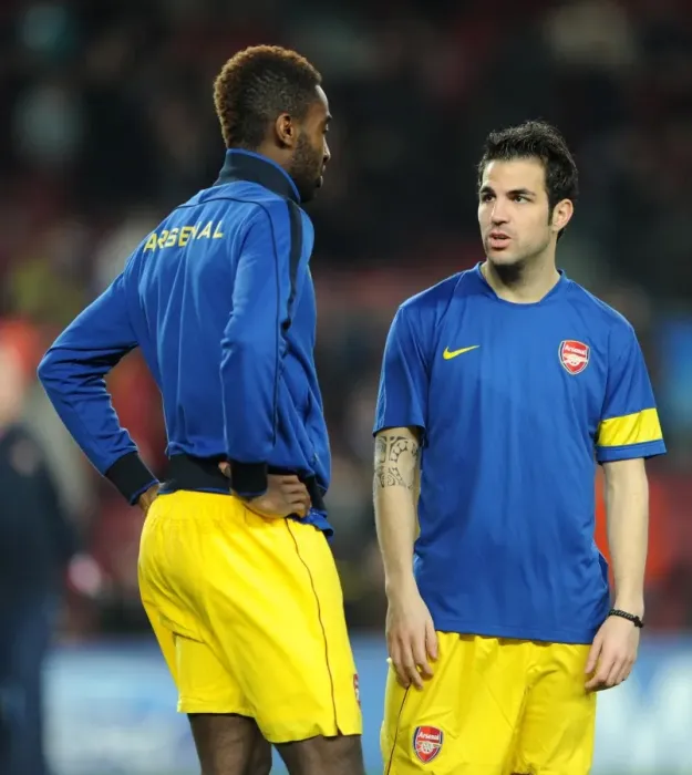 Framed Print : Cesc Fabregas chats to Johan Djourou (Arsenal) before the match. Barcelona 3: 1 Arsenal