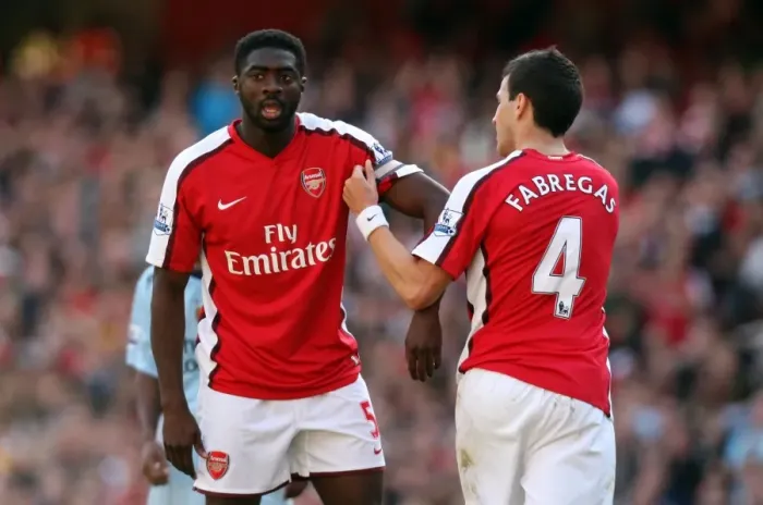Framed Print : Cesc Fabregas hands over the captains arm band to Kolo Toure