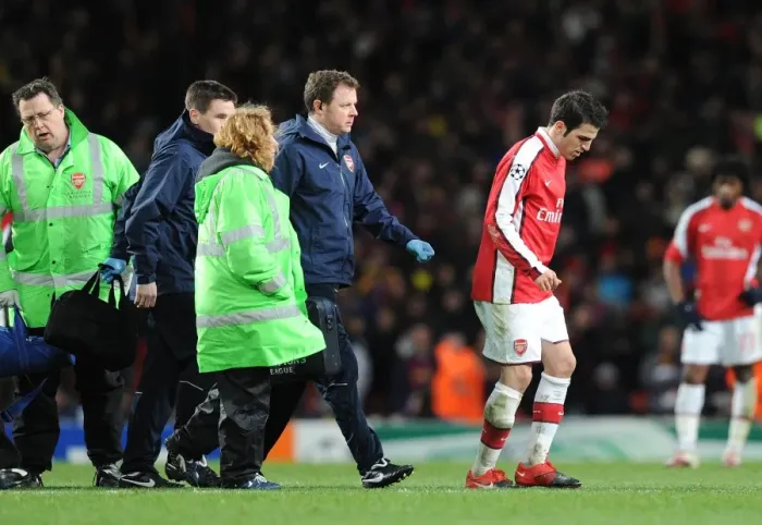 Framed Print : Cesc Fabregas Injured: Arsenal Captain Limps Off Against Barcelona in UEFA Champions League Quarterfinal Framed Print : Cesc Fabregas Injured: Arsenal Captain Limps Off Against Barcelona in UEFA Champions League Quarterfinal