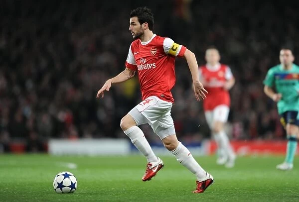 Cesc Fabregas Leads Arsenal to 2-1 Victory over Barcelona in UEFA Champions League