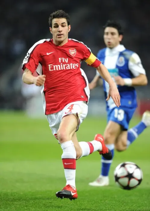 Framed Print : Cesc Fabregas Leads Arsenal in First Leg of UEFA Champions League Showdown against FC Porto
