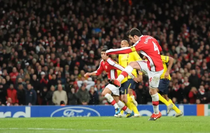 Framed Print : Cesc Fabregas Scores Dramatic Penalty Past Valdes in Arsenal's EUFA Champions League Battle with Barcelona