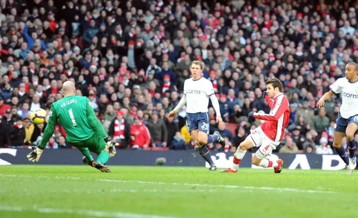 Framed Print : Cesc Fabregas shoots past Aston Villa goalkeeper Brad Friedel to score the 2nd Arsenal goal