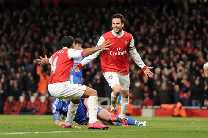 Framed Print : Cesc Fabregas and Theo Walcott Celebrate Arsenal's 2-1 Lead Over Chelsea in the Premier League