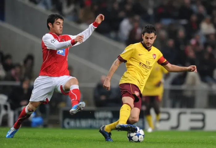 Framed Print : Cesc Fabregas vs Miguel Garcia: Arsenal's 2-0 Victory over SC Braga in UEFA Champions League Group H