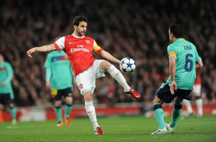 Framed Print : Cesc Fabregas vs Xavi: Arsenal's Victory Over Barcelona in the UEFA Champions League (2011)