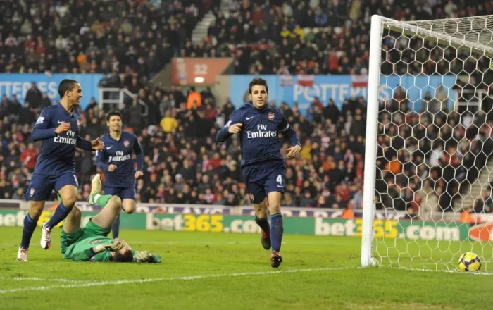 Framed Print : Cesc Fabregas's Brilliant Strike: Arsenal's Winning Moment vs Stoke City (27 / 2 / 2010)