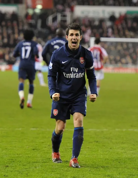 Framed Print : Cesc Fabregas's Stunner: Arsenal's Triumphant 3-1 Over Stoke City