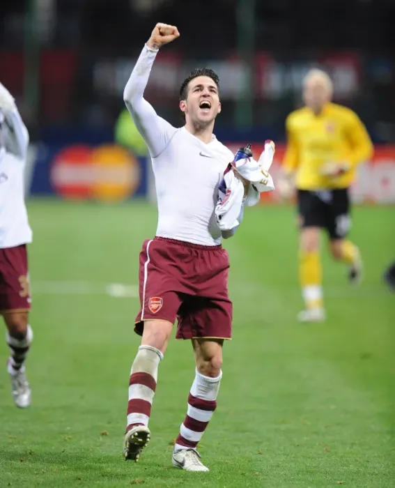 Framed Print : Cesc Fabregas's Triumph: Arsenal's 2-0 Victory Over AC Milan in Champions League