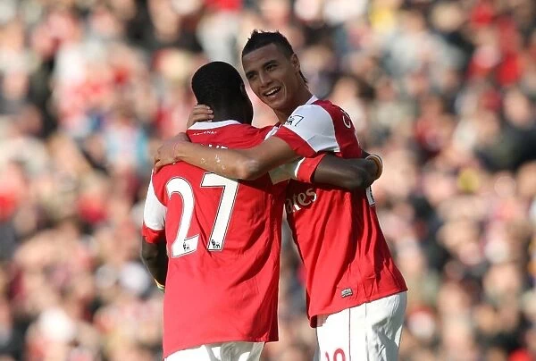 Chamakh and Eboue: Arsenal's Unstoppable Duo Celebrates 2-1 Win Over Birmingham