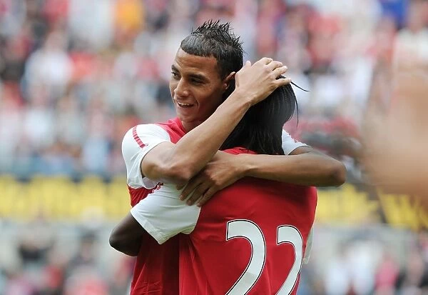 Chamakh and Gervinho Celebrate Arsenal's First Goal in Cologne Friendly