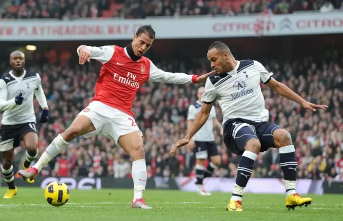 Framed Print : Chamakh vs Kaboul: Tottenham's Triumph over Arsenal in the Premier League (2010-11)