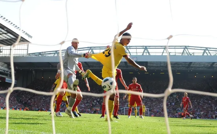 Framed Print : Chamakh vs. Reina: Aerial Clash in the 1-1 Liverpool vs. Arsenal Draw Framed Print : Chamakh vs. Reina: Aerial Clash in the 1-1 Liverpool vs. Arsenal Draw