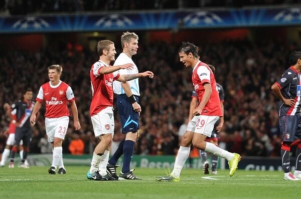 Chamakh and Wilshere: Arsenal's Unstoppable Duo Celebrates 3rd Goal vs. SC Braga in Champions League