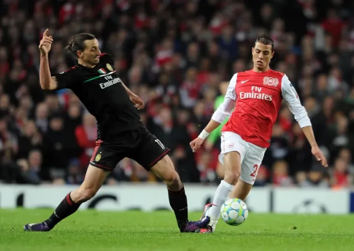Framed Print : Chamakh's Hat-Trick: Arsenal Crushes AC Milan 3-0 in UEFA Champions League