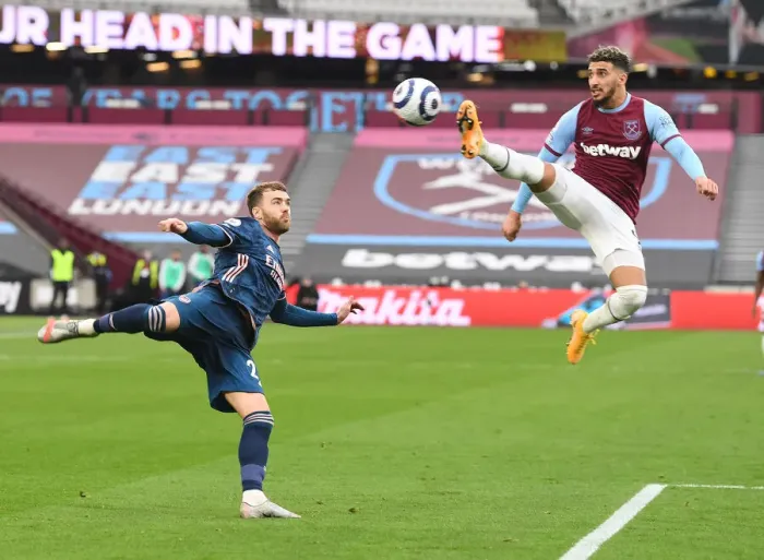 Framed Print : Chambers vs Benrahma: A Battle in Empty London Stadium - West Ham United vs Arsenal, Premier League 2021 Framed Print : Chambers vs Benrahma: A Battle in Empty London Stadium - West Ham United vs Arsenal, Premier League 2021