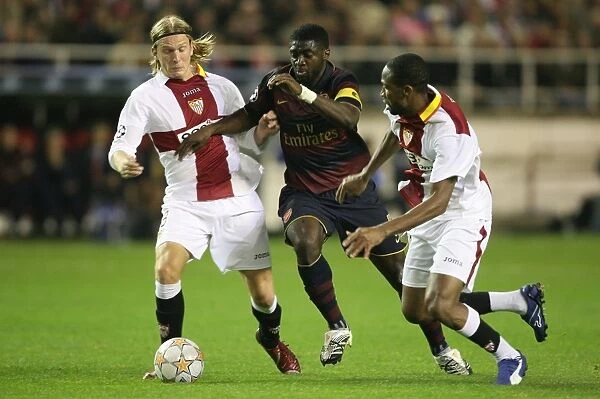Champions Clash: Kolo Toure, Seydou Keita, and Christian Poulsen in Seville's 3-1 Victory over Arsenal, UEFA Champions League, Group H
