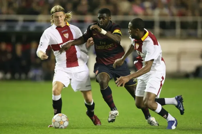 Framed Print : Champions Clash: Kolo Toure, Seydou Keita, and Christian Poulsen in Seville's 3-1 Victory over Arsenal, UEFA Champions League, Group H