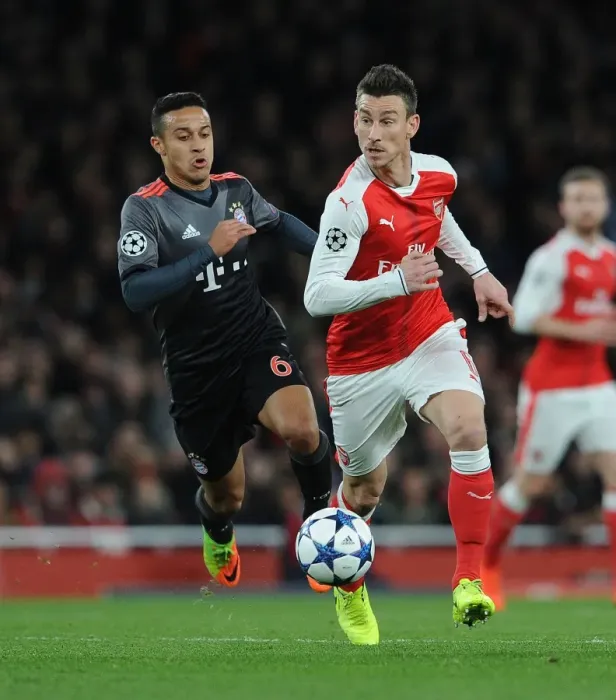 Framed Print : Champions Clash: Koscielny vs Thiago - Arsenal vs Bayern Munich, Champions League Battle Framed Print : Champions Clash: Koscielny vs Thiago - Arsenal vs Bayern Munich, Champions League Battle